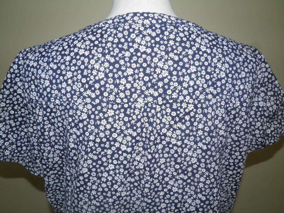 Camisa manga curta, muito feminina e confortável