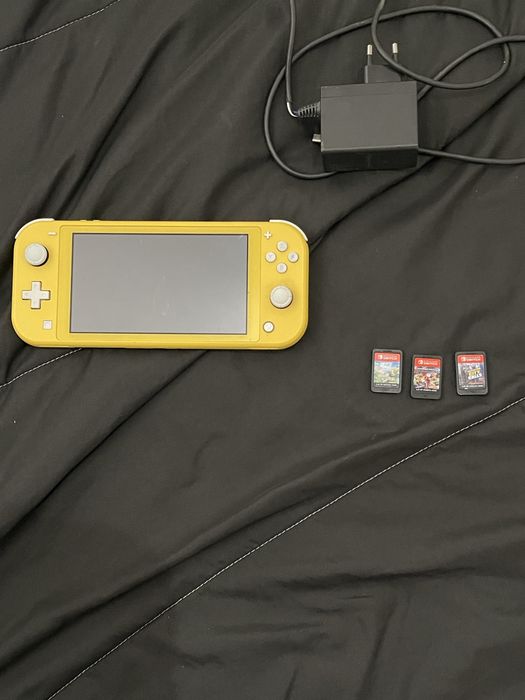 Nitendo Switch Lite + carregador + 3 jogos 140€ negociaveis