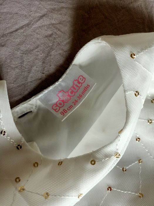 Elegancka biała sukienka 98