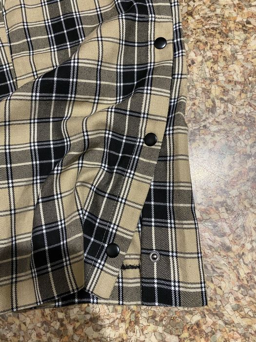 Штани на кнопках фірми Stradivarius