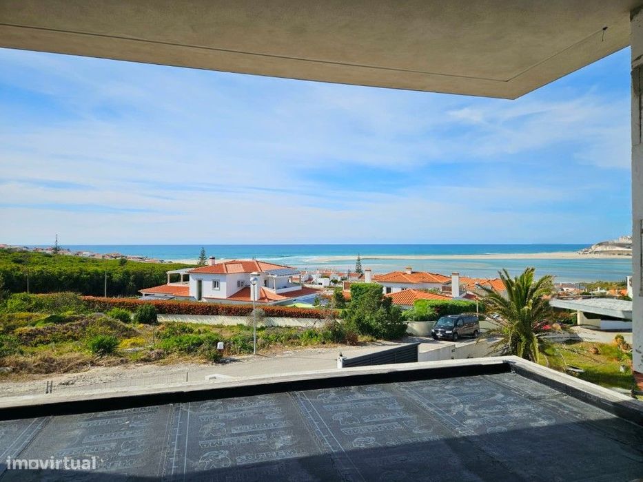 Moradia vista lagoa, praia e mar perto de vários campos de golfe