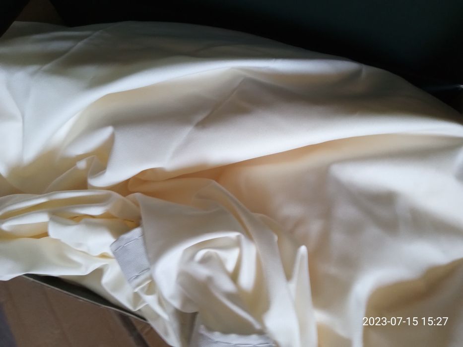 Trójkątny żagiel ogrodowy