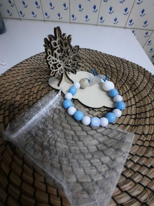 Prendedor de chupeta e lembranças de natal