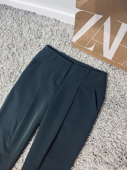 Ciemnozielone damskie spodnie s biurowe