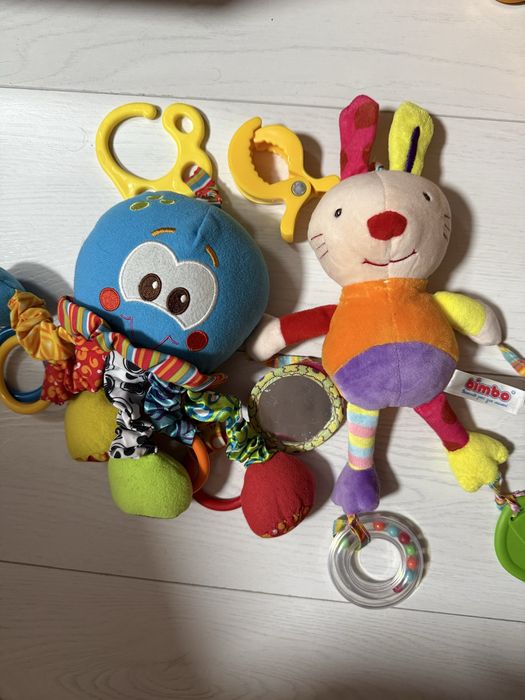 Іграшки підвіски на коляску