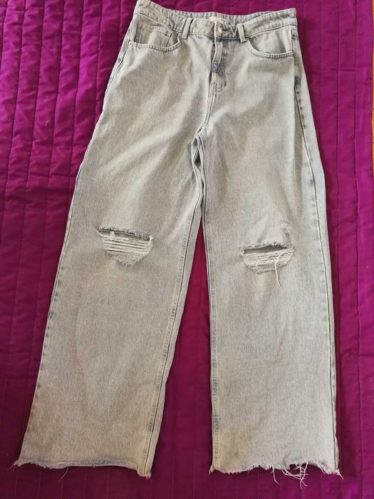 damskie jeansy z dziurami wide leg Sinsay 42