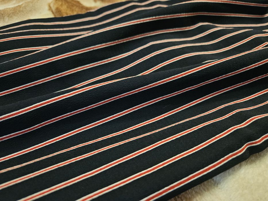 Жіночий літній комбінезон у синьо-червону смужку