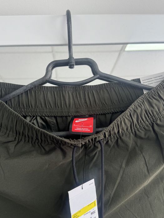 Нові Найк Nike Tech штани завужені стильні оливкові S розмір