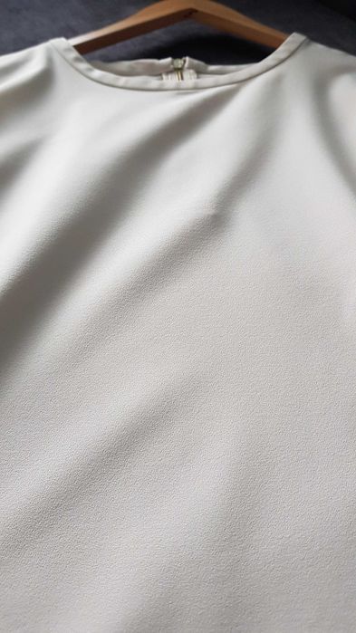 Elegancka beżowa bluzka z rękawem 3/4, oversize