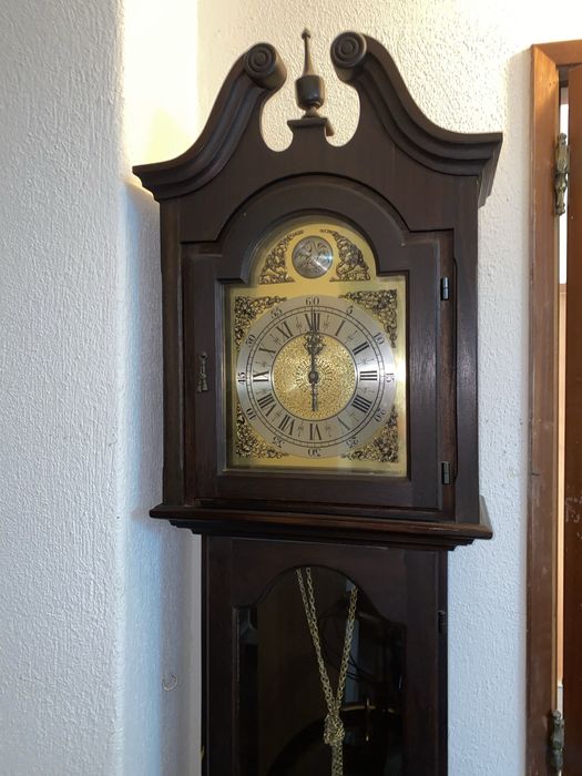 Relógio com pêndulo