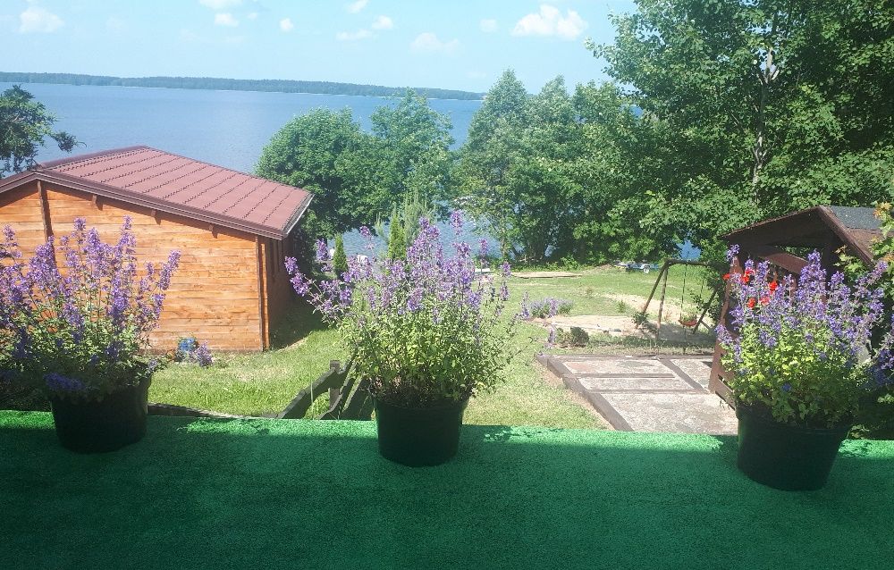 Domek całoroczny nad jeziorem- Mazury .