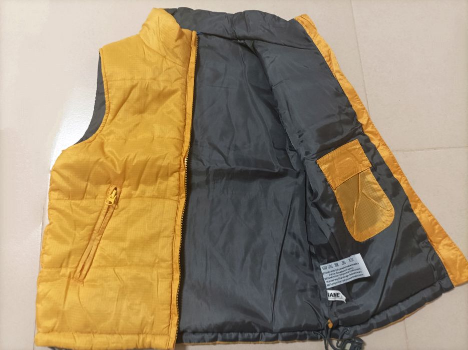 Colete amarelo acolchoado para Rapaz (8 anos)