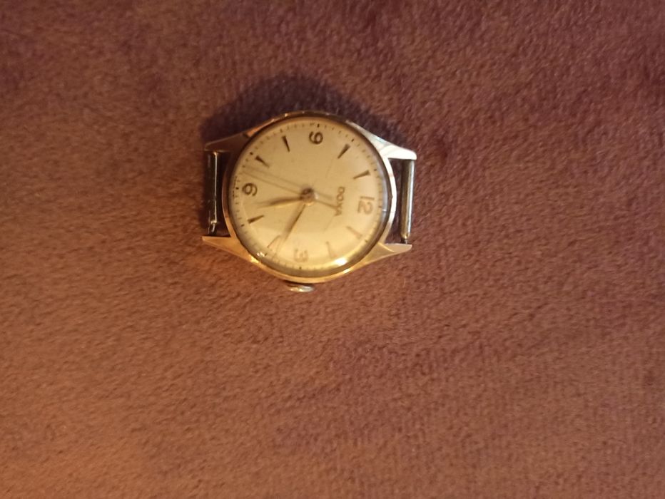 Złoty damski zegarek Doxa