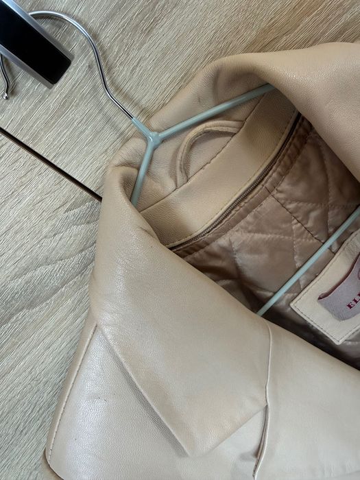 Skórzany płaszcz firmy Elegancja