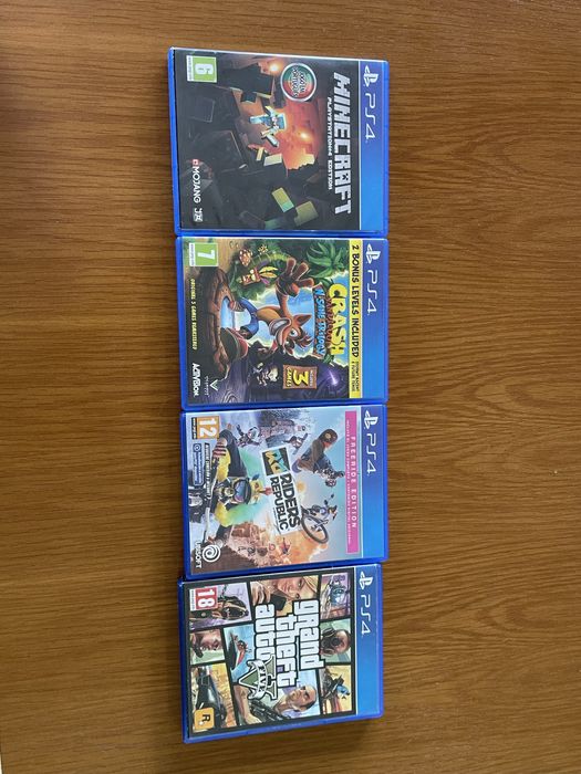 Ps4 slim 500GB usada com caixa + 4 jogos