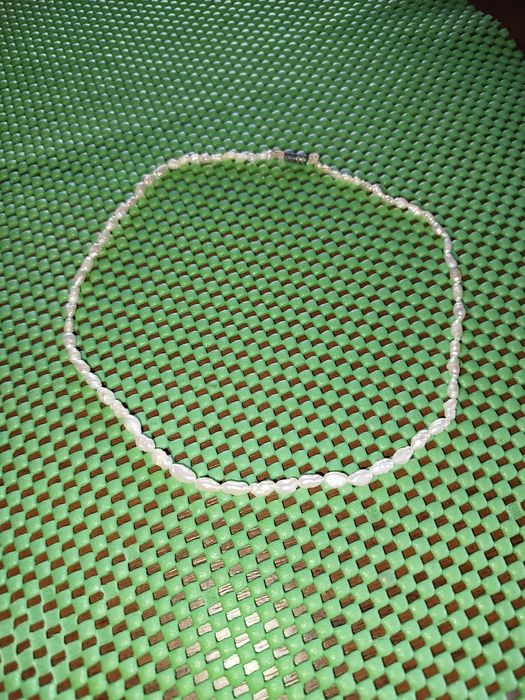 Украшение из жемчуга