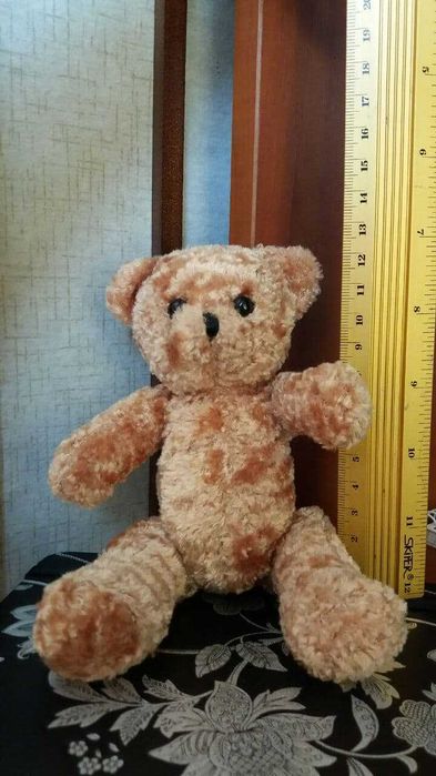 Мягкий плюшевый мишка