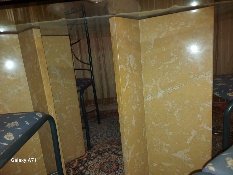 Glass table with beveled edges and marble legs64585235531777122