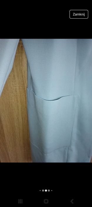 Śliczny błękitny płaszczyk na suwak