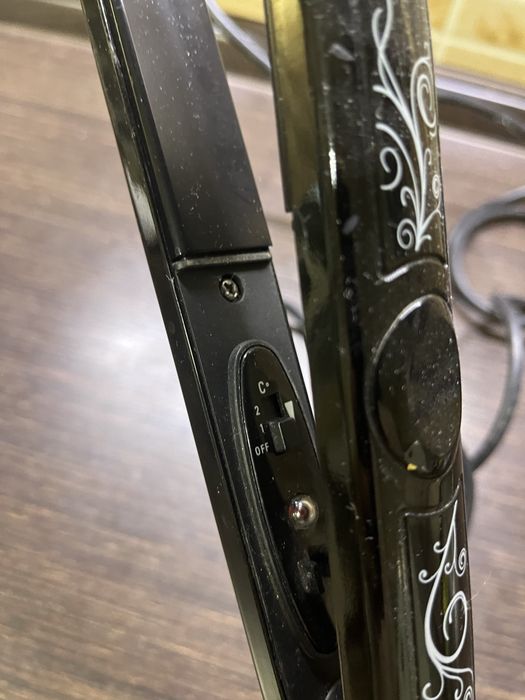 Випрямляч для волосся Rowenta