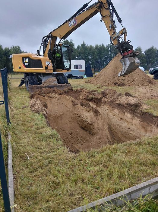 Usługi Koparką Prace Ziemne Wykopy Pod Fundamenty Płyty Fundamentowe Drogi Szamba Niwelacja Terenu