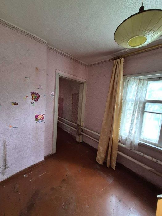 Продам 1\2 частина будинку м. Зміїв