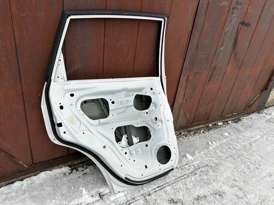 Дверка двері кляпа Chevrolet Captiva