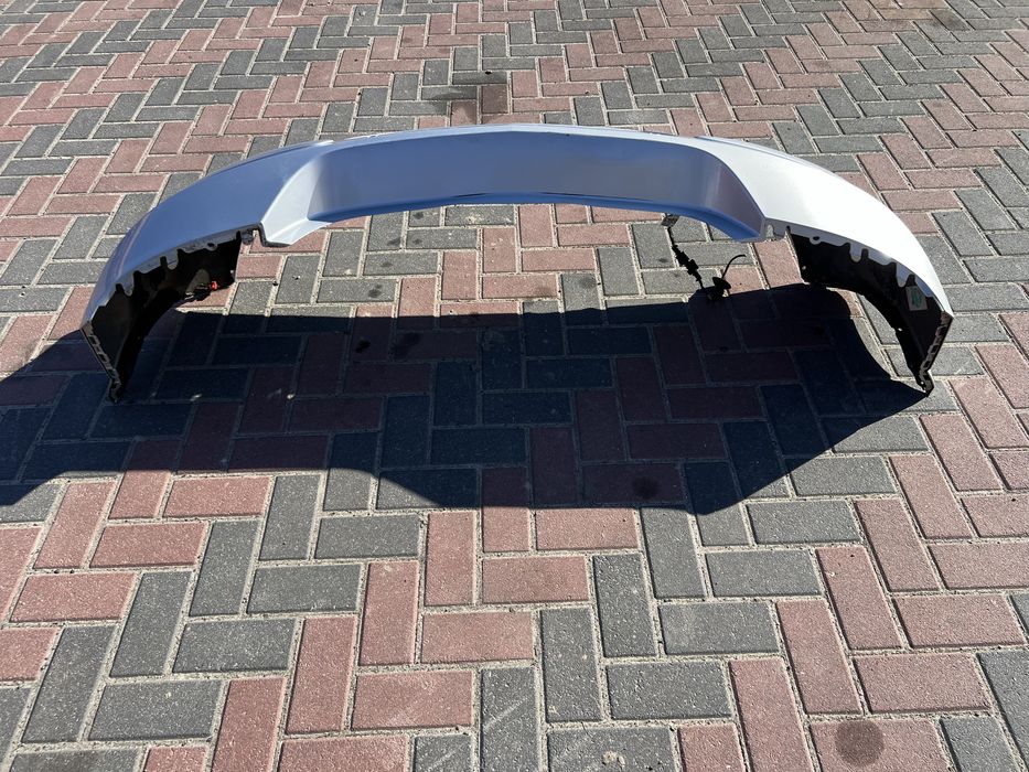 Задній бампер Опель Астра Н