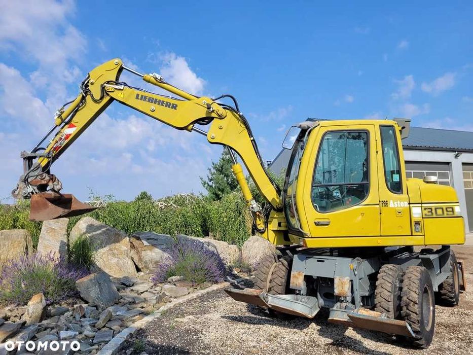 LIEBHERR 309 Klima, 4 łyżki + widły, Nowe opony! Kamera