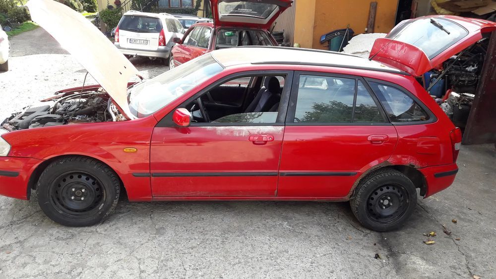 mazda 323  323f bj  premacy kielich przód przedni mocowanie nadkole
