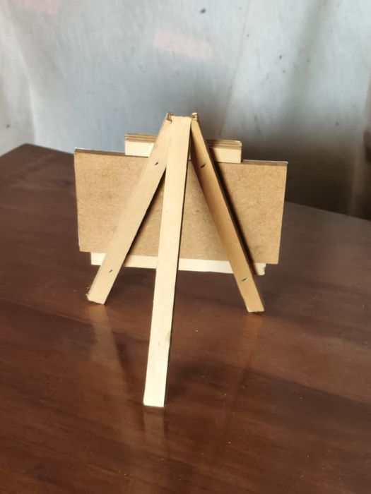 Wooden Easel with Canvas Featuring a Message64575242213251121