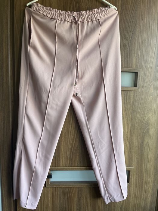 lekkie różowe eleganckie spodnie Zara S ubrane raz