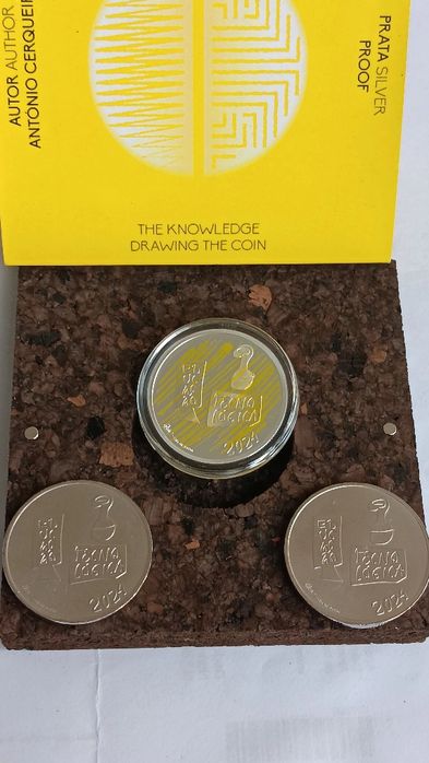 Moedas do Conhecimento.