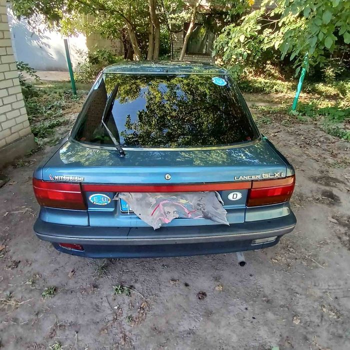 Mitsubishi Lancer 90 года