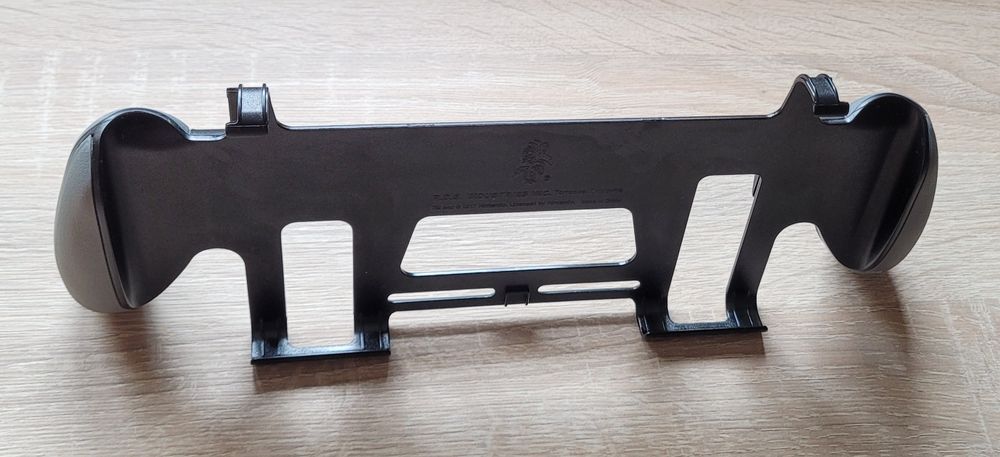 Używany grip uchwyt do konsoli Nintendo Switch V1, V2 i Oled.