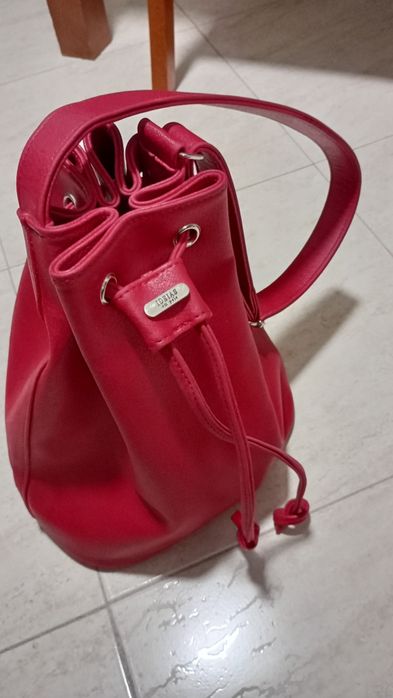 Mala vermelha em pele