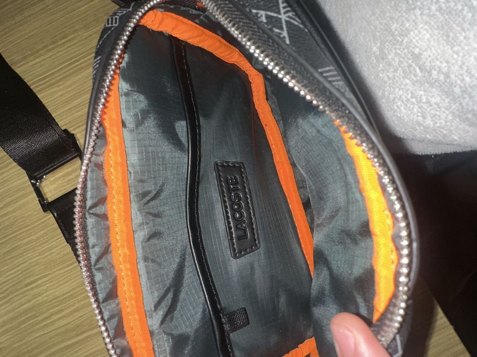 Bolsa lacoste seme nova