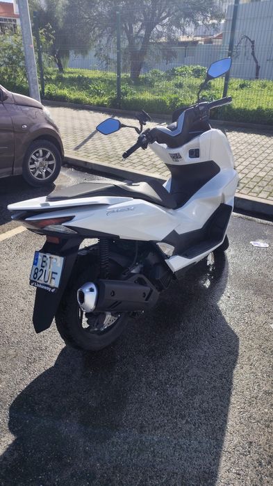 PCX 2025 - troco em carro
