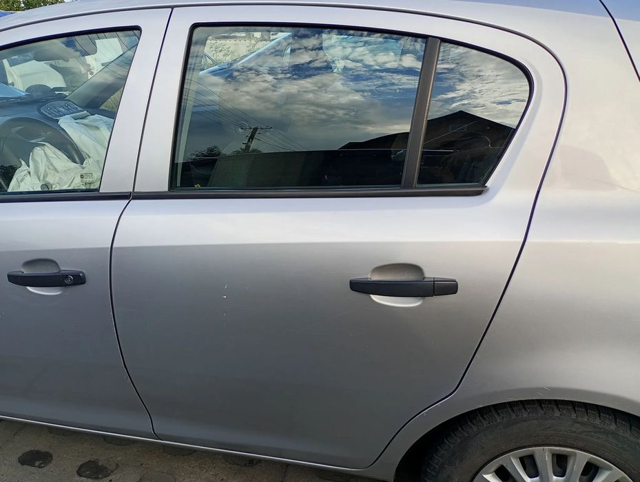 OPEL CORSA D 5d drzwi lewe tylne lewy tył Z157 srebrne