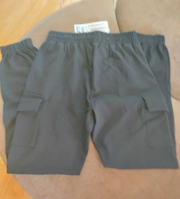 Nowe czarne spodnie bojówki 36