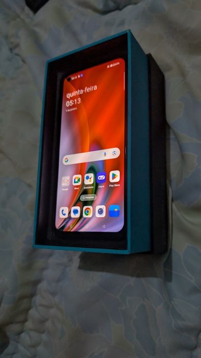 Vendo telemóvel marca onplus norde2  5G caixa cabeço duas  capa