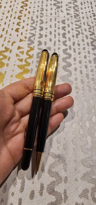 Conjunto canetas douradas