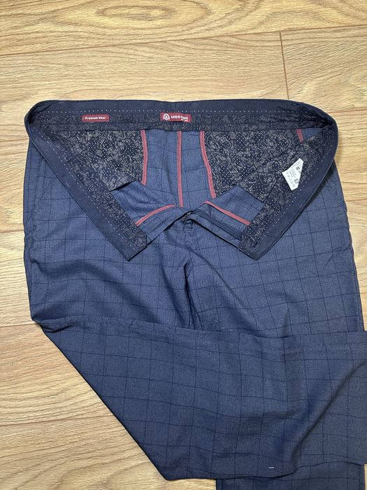 Брюки класичні в клітинку синього коліру