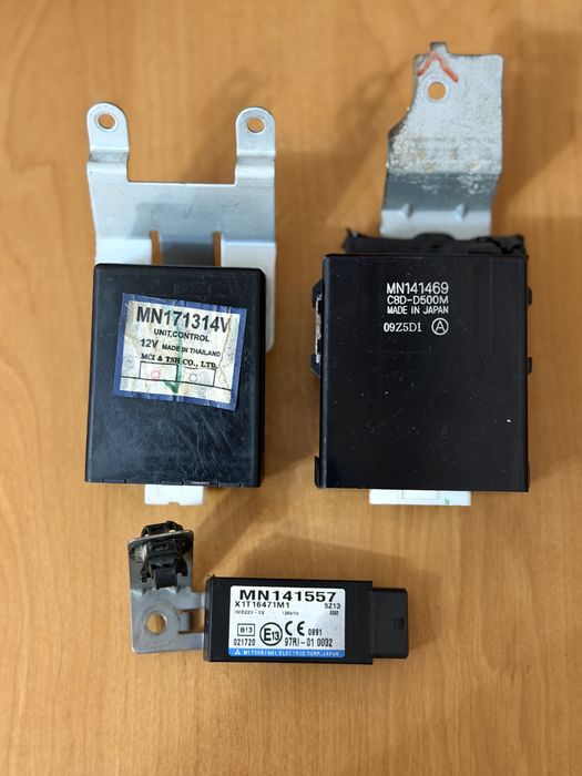 Mitsubishi L200. Шлейф L200. Підрульовий перемикач L200. Панель L200