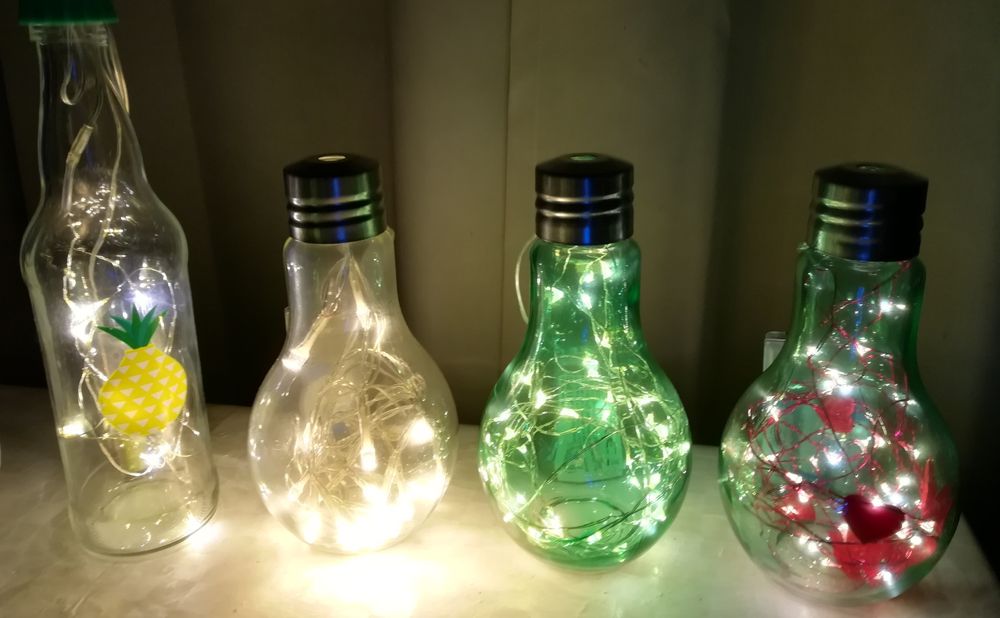 Ofereça de um modo criativo  lâmpadas e/ou garrafas iluminadas