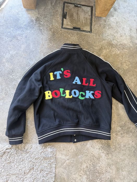 Supreme x Jamie Reid “It’s All Bollocks” Varsity Jacket — Black, SS21 — SKU SS21J65 BLACK.