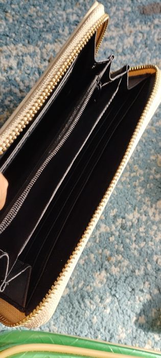 Gucci, clinique., torebka ,kosmetyczki itp