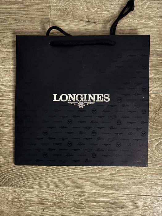 Torebka granatowa ze srebrnym napisem Longines