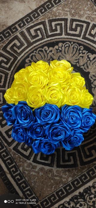 Букети квітів з атласної стрічки