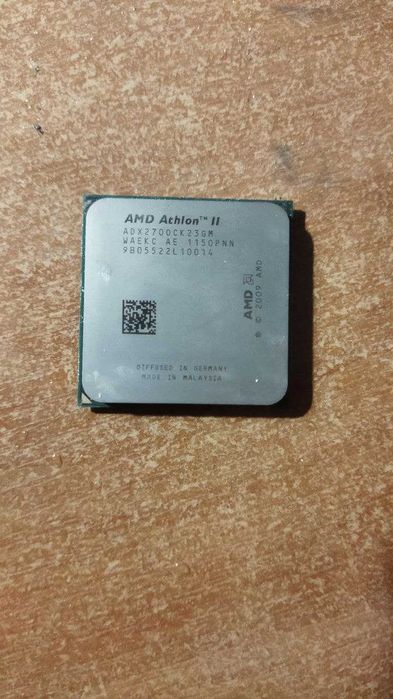 Процессоры  Intel® Celeron® D 331 и AMD Athlon ll (2) ADX2700